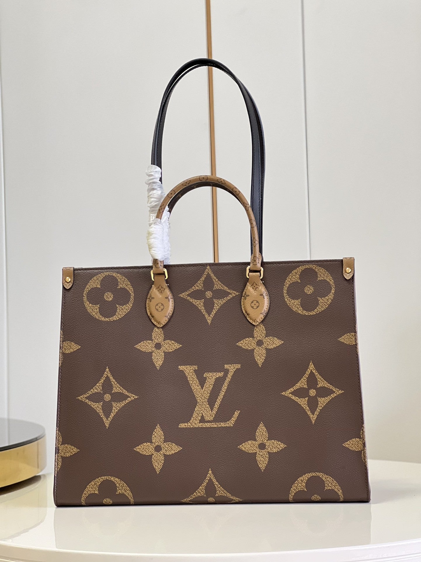 OnTheGo Monogram Canvas Bag
