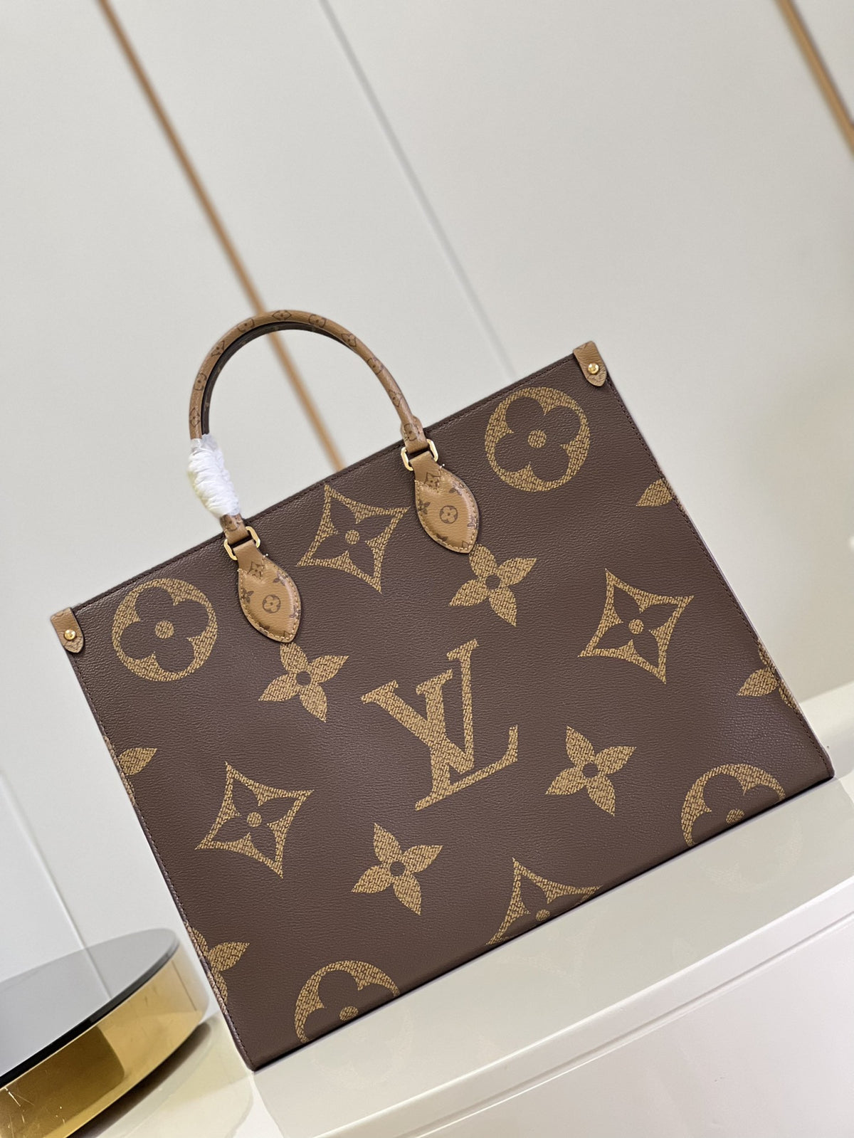OnTheGo Monogram Canvas Bag