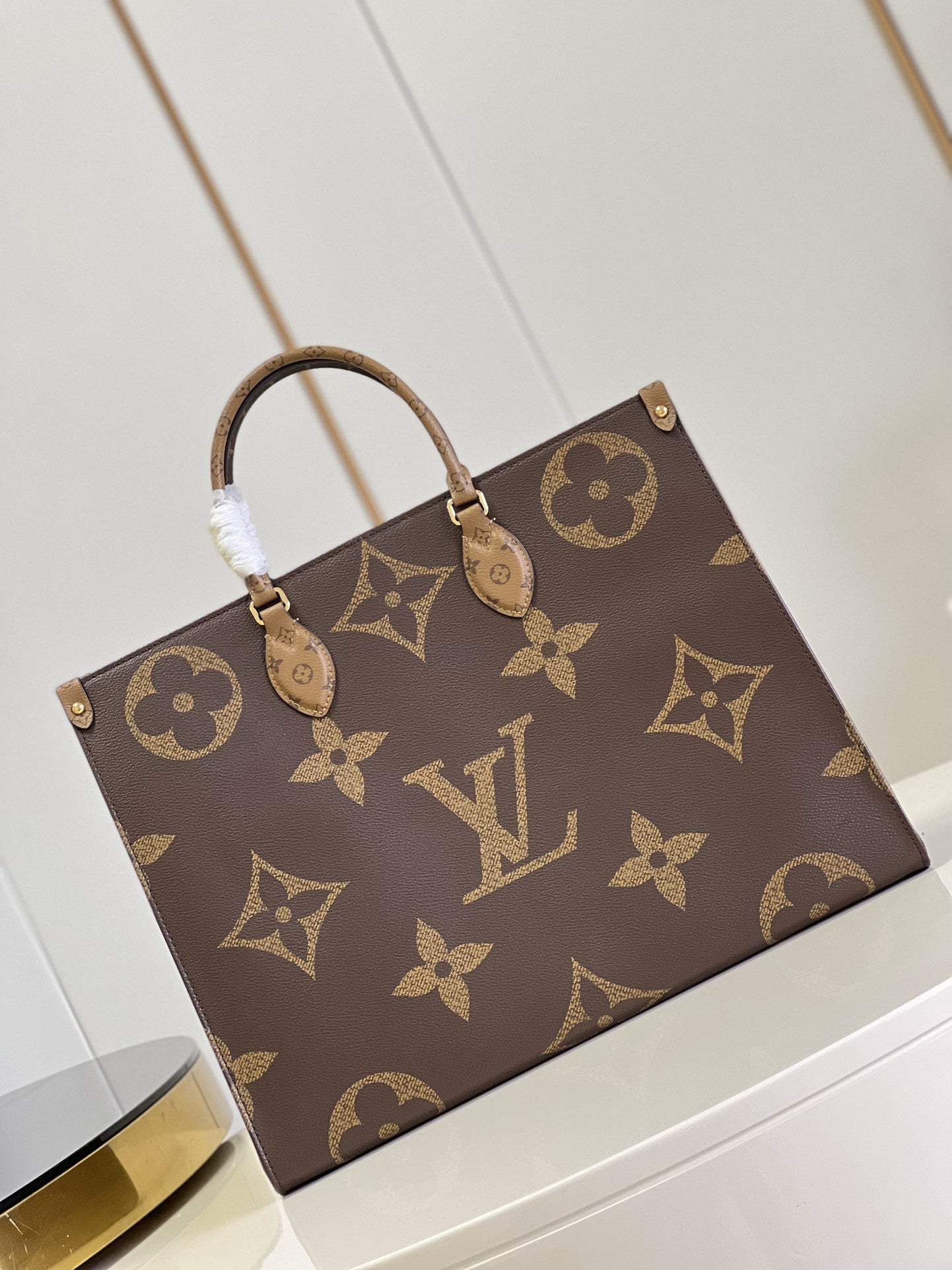 OnTheGo Monogram Canvas Bag