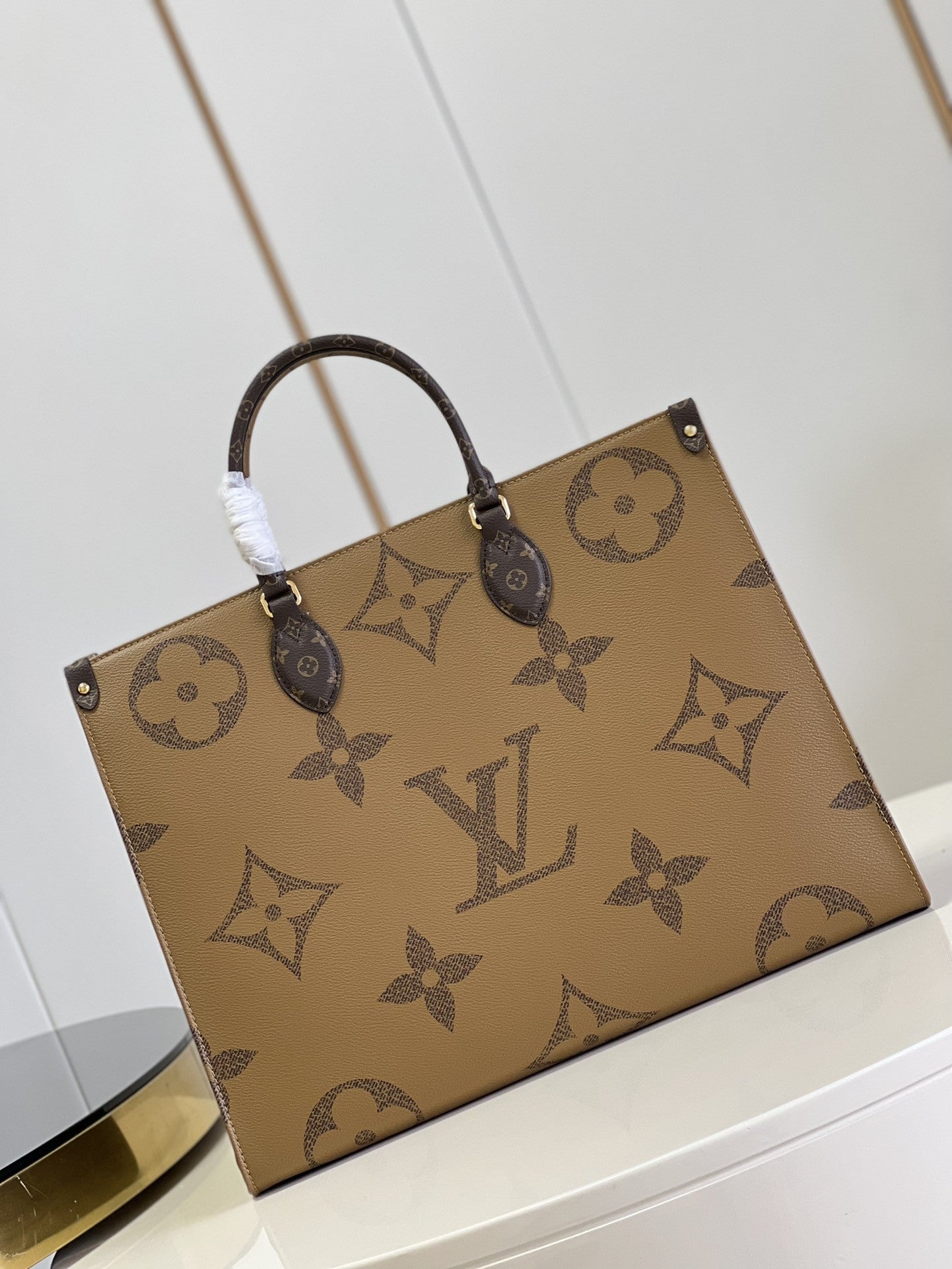 OnTheGo Monogram Canvas Bag