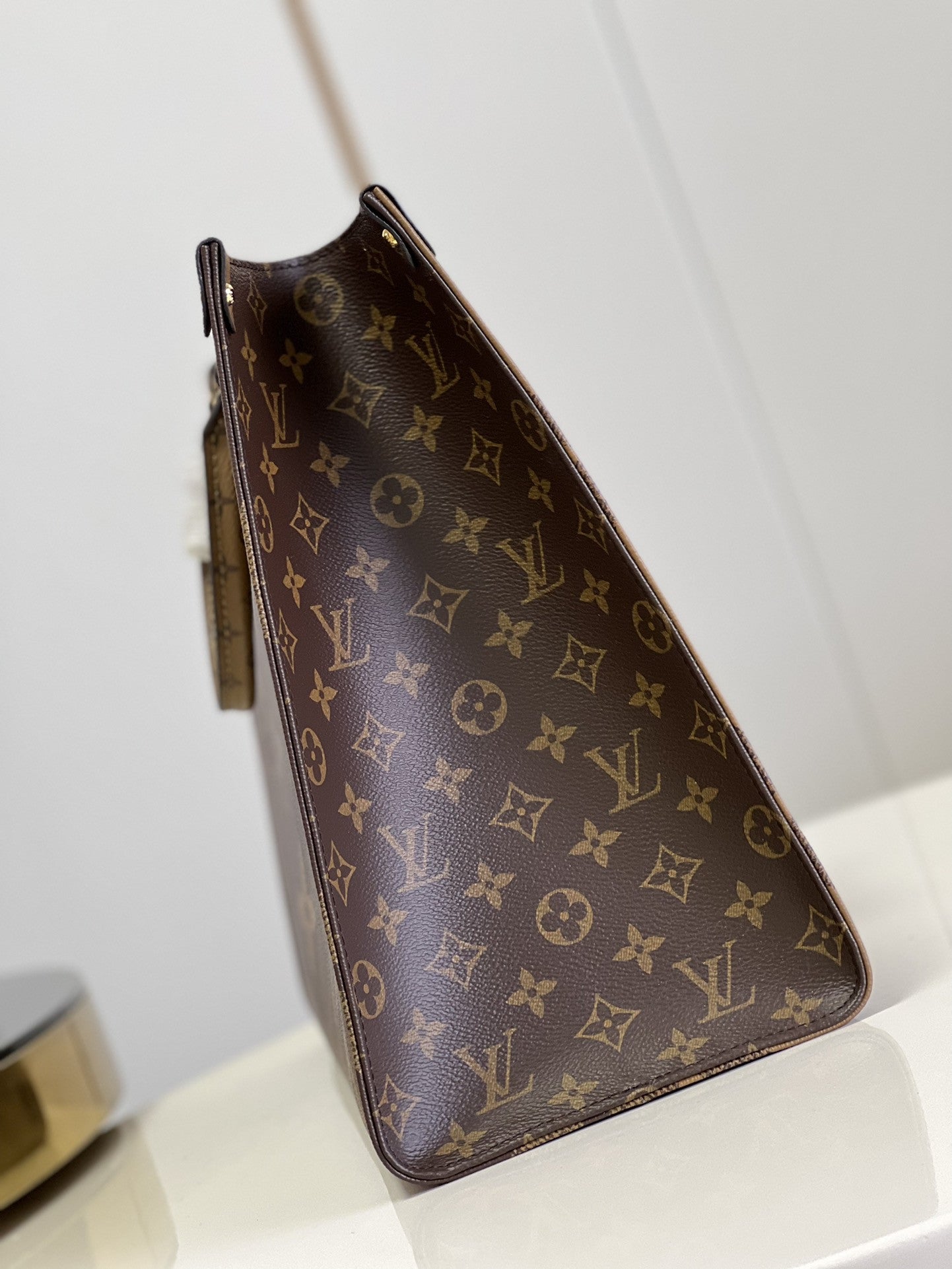 OnTheGo Monogram Canvas Bag